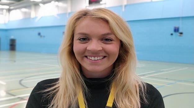 Louise Neil in tennis court 